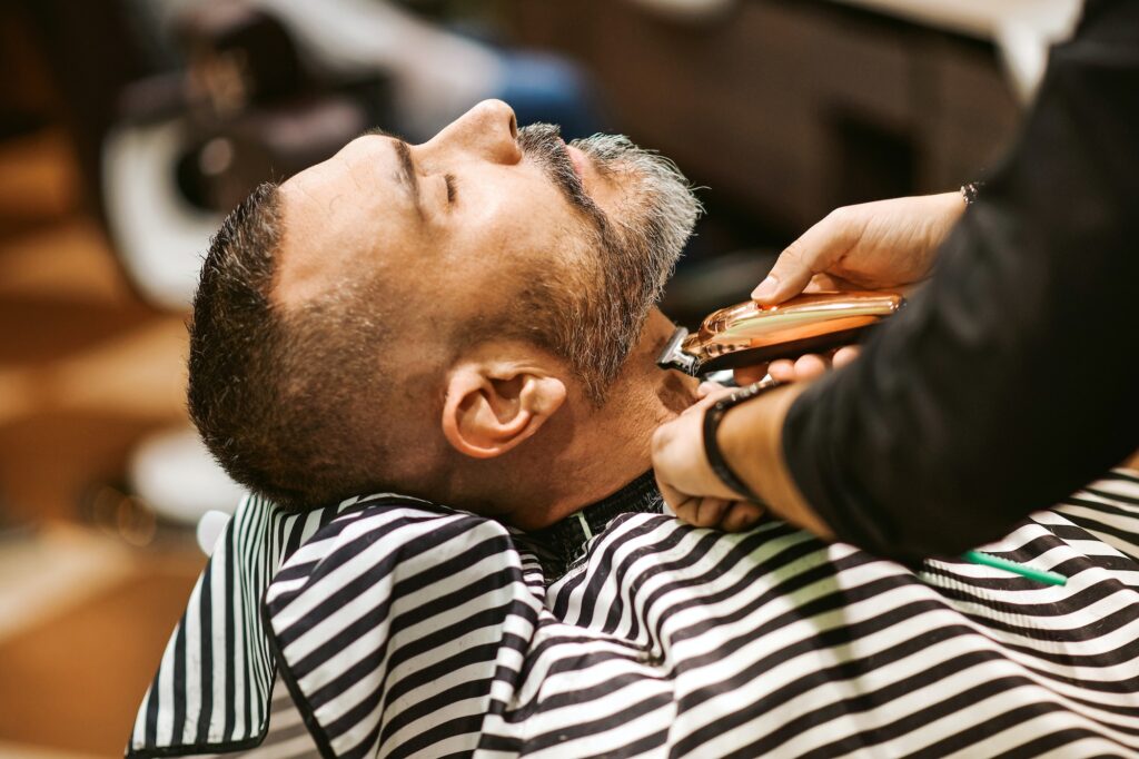 barber-trims-the-beard-of-the-customer.jpg